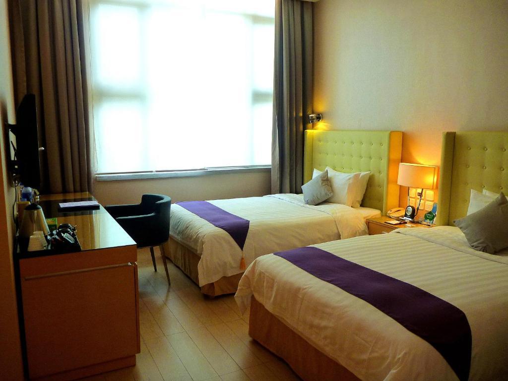 Shenzhen The Bauhinia Hotel, Mix City Shopping Center Kamer foto